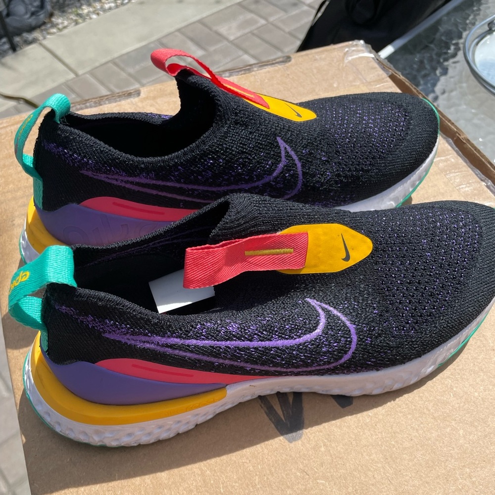 Size 5 womens Nike slip ons